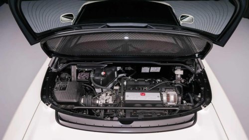 The coupe with Aston looks and Honda daily-driver manners