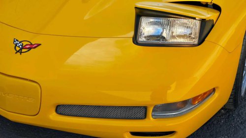 Why are pop-up headlights banned for pedestrian safety when giant pickup trucks are legal?