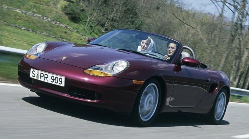 Which model saved Porsche from bankruptcy in the '90s?