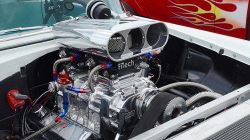 Why do some muscle cars have blowers on the hood? Here's what they're for