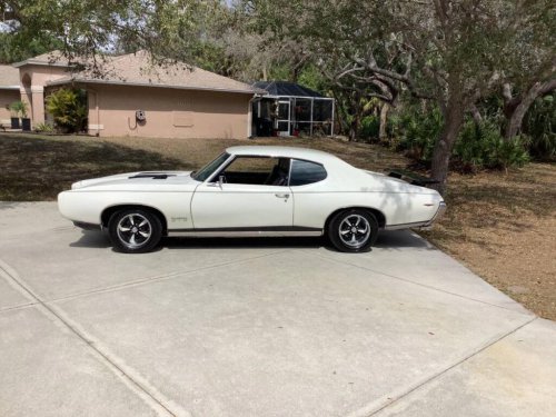 Two 1969 Pontiac GTOs hit the market — one forgotten relic, one 500-HP monster, both facing a deadline