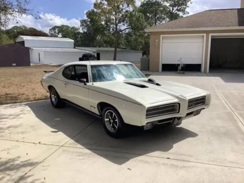 Two 1969 Pontiac GTOs hit the market — one forgotten relic, one 500-HP monster, both facing a deadline