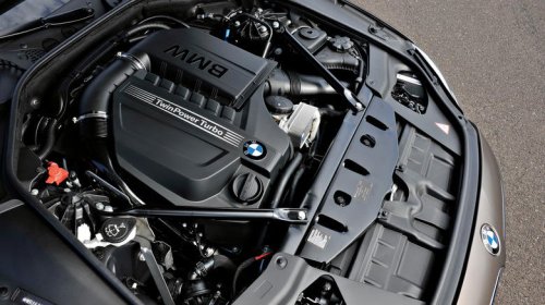 Why are BMW engines slanted?