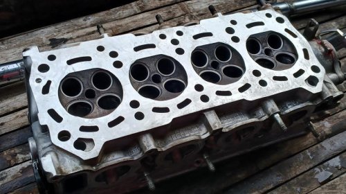 What engine parts are most susceptible to carbon buildup?