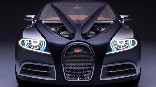 The 235 mph family car with 16 cylinders and eight exhaust pipes