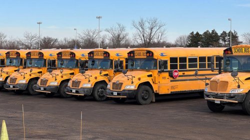 What type of engines do school buses have under the hood?