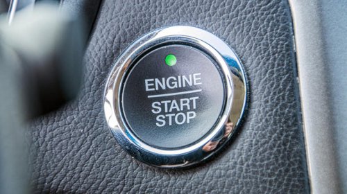 What happens if you hit a car's power button while driving at speed?