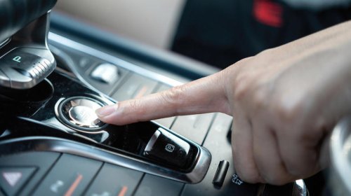 What happens if you hit a car's power button while driving at speed?