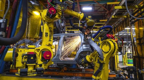 Who owns Cadillac and where are its cars made?