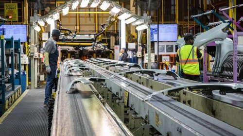 Who owns Cadillac and where are its cars made?