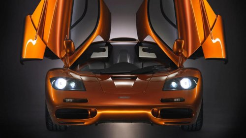 Which classic car had the first butterfly doors?