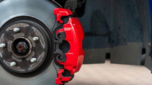 Why do some cars have red brake calipers?