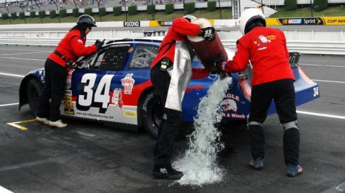 How big is a NASCAR fuel tank & how much gas does the car burn during one race?