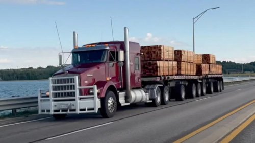 Why do semi trucks in Michigan have so many wheels?