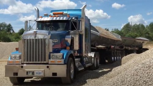 Why do semi trucks in Michigan have so many wheels?