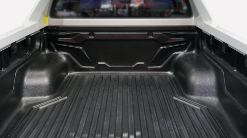 Who actually makes Michelin's pickup truck bed mats? Hint: It's not Michelin