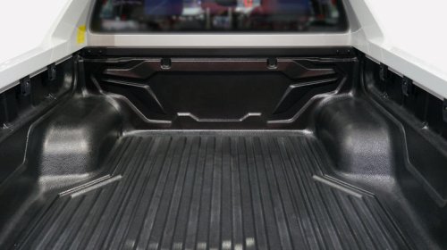 Who actually makes Michelin's pickup truck bed mats? Hint: It's not Michelin