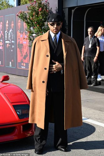 Lewis Hamilton poses with his new £3M Ferrari F40 at the Italian Grand Prix