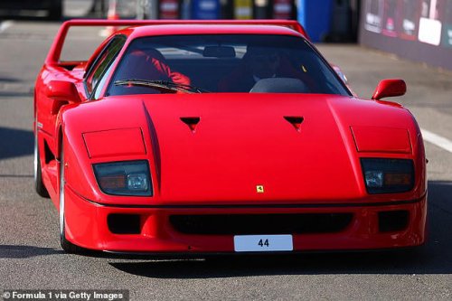 Lewis Hamilton poses with his new £3M Ferrari F40 at the Italian Grand Prix