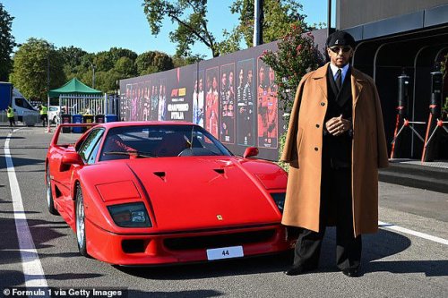 Lewis Hamilton poses with his new £3M Ferrari F40 at the Italian Grand Prix