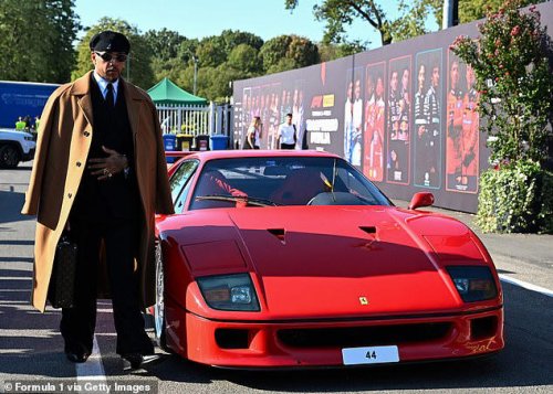 Lewis Hamilton poses with his new £3M Ferrari F40 at the Italian Grand Prix