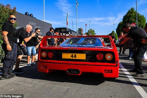 Lewis Hamilton poses with his new £3M Ferrari F40 at the Italian Grand Prix