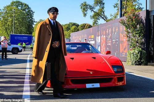 Lewis Hamilton poses with his new £3M Ferrari F40 at the Italian Grand Prix