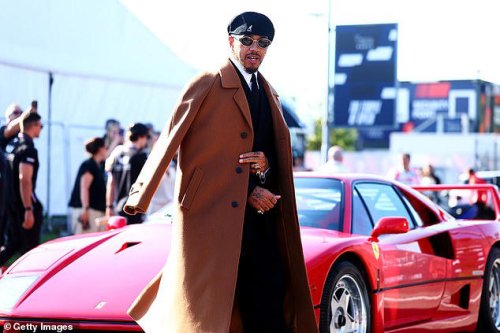 Lewis Hamilton poses with his new £3M Ferrari F40 at the Italian Grand Prix