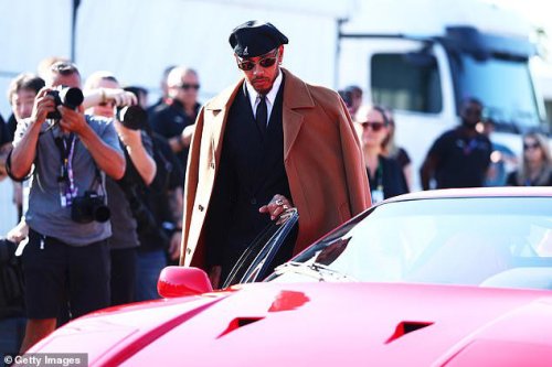 Lewis Hamilton poses with his new £3M Ferrari F40 at the Italian Grand Prix