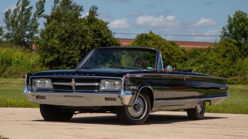 Chrysler's wood-and-chrome luxury sedan hid a 360-HP wedge and a stick