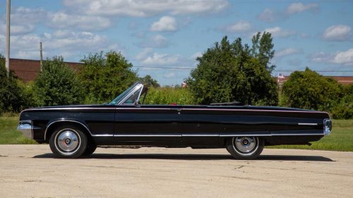 Chrysler's wood-and-chrome luxury sedan hid a 360-HP wedge and a stick