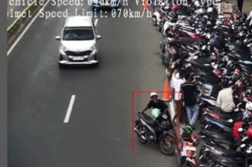 Ini Aneh, Tukang Parkir Kena Tilang Elektronik Saat Merapikan Motor