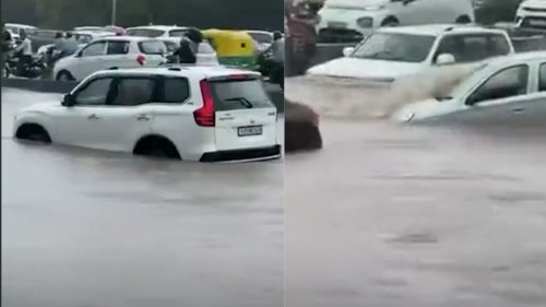 SUV Driver Showed Off by Splashing Cars and Bystanders—Then Karma Struck Seconds Later