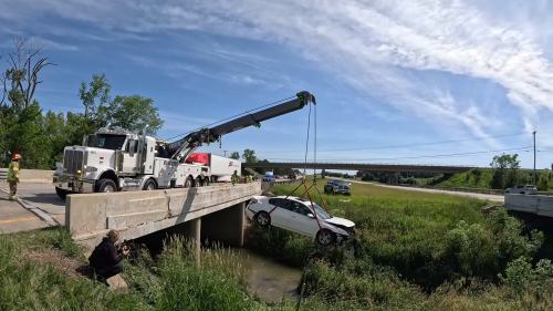 Nissan Takes a Creek Detour on I-75 and a Rotator Crew Has to Fish It Out