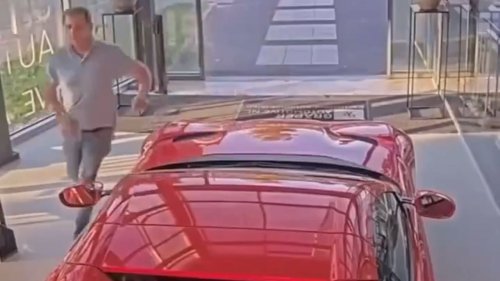 Luxury Car Dealer Drove 15 Exotics Out of a Burning Building, Then Police Hit Him with Pepper Spray