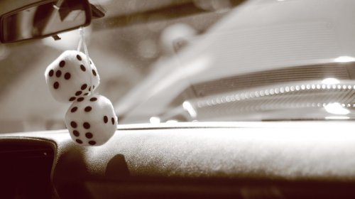 Why Those Fuzzy-Dice Hanging From The Review Mirror Have Nearly Disappeared