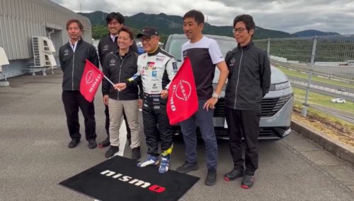 Wait, What? Toyota Chairman Spotted Waving Nissan Flags, Urges Customers to Buy The Murano