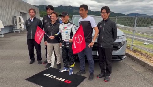 Wait, What? Toyota Chairman Spotted Waving Nissan Flags, Urges Customers to Buy The Murano