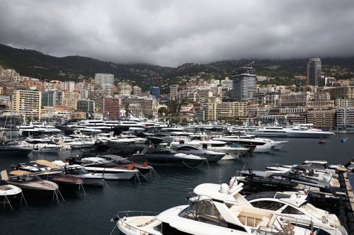 Audi F1 car and rare Koenigsegg hypercar craned onto $75million superyacht ahead of Monaco GP