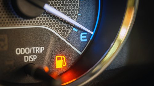 Why A Gentle Breeze Can Wreck Your MPG: Headwind Physics Explained