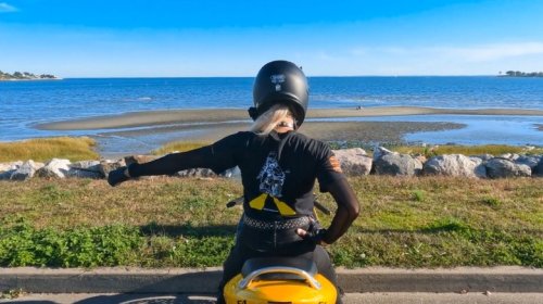 What Does It Mean When A Biker Puts Their Left Fist Out And Moves It Up And Down?