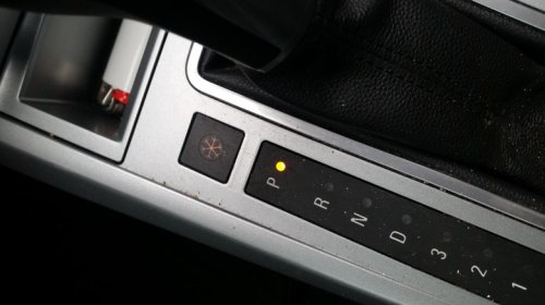 If Your Car Has A Snowflake Button Near The Gear Shift, Here's What It Does