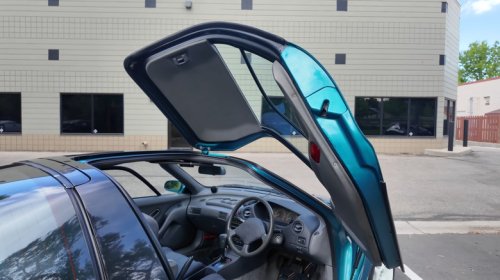 What Is The Cheapest Car That Has Butterfly Doors?