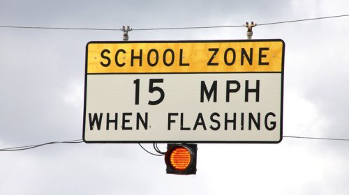 Why Do Some Speed Limit Signs Have Flashing Yellow Lights?