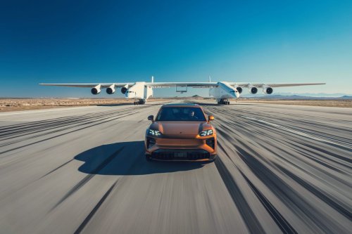 Watch a Porsche Cayenne Electric Keep Pace With the World's Largest Flying Plane