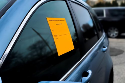 If You See an Orange Sticker on a Car, This Is What It Means