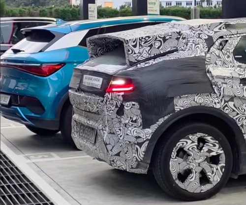 Perodua ‘QV-E’ EV parked next to BYD Atto 3 while testing shows good size, proportions; daring roofline