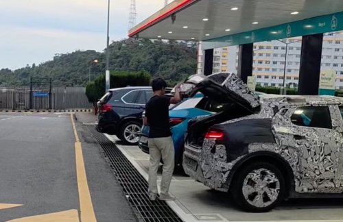 Perodua ‘QV-E’ EV parked next to BYD Atto 3 while testing shows good size, proportions; daring roofline
