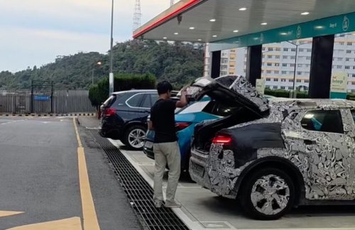 BYD, BYD Atto 3, Perodua ‘QV-E’ EV parked next to BYD Atto 3 while testing shows good size, proportions; daring roofline