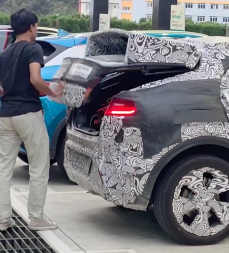 Perodua ‘QV-E’ EV parked next to BYD Atto 3 while testing shows good size, proportions; daring roofline